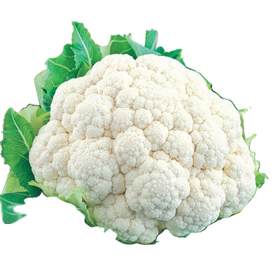 Close-up of a cauliflower head with green leaves and red tomatoes in the background