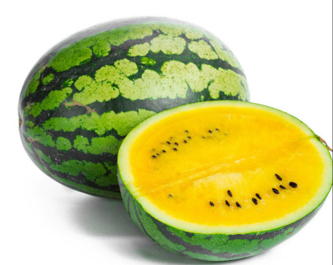 Half-cut watermelon with green rind and yellow flesh on a white background