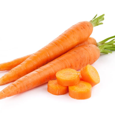 A group of fresh, whole Carrot Tendersweet carrots with a few sliced pieces in the foreground.