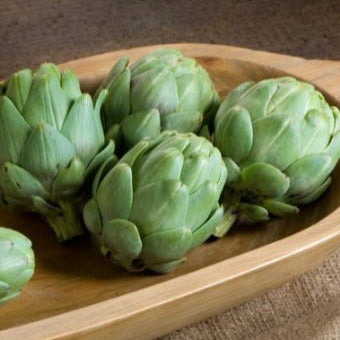  Artichokes on a wooden plate